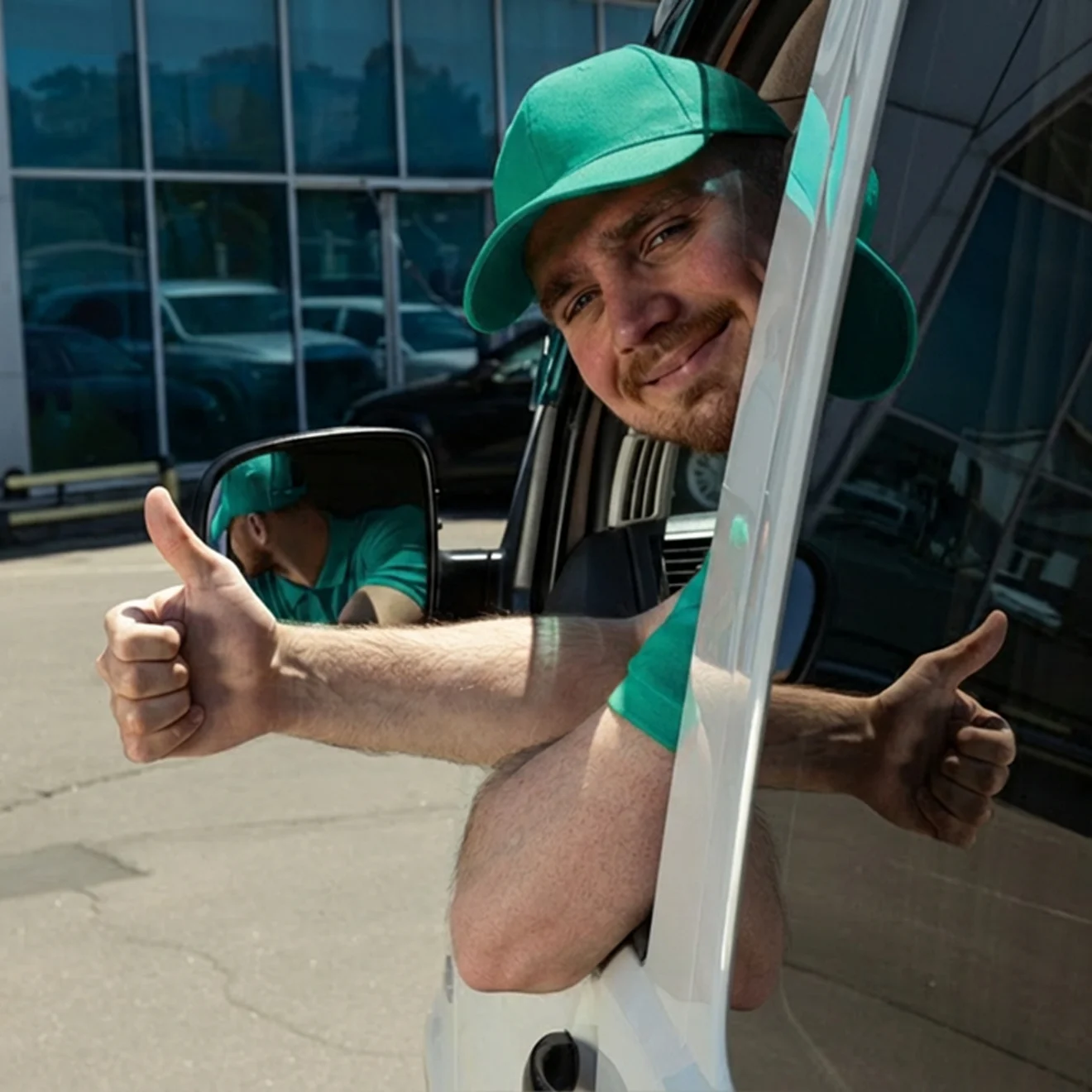 Smiling young man in vehicle